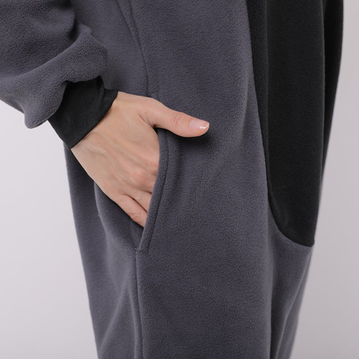 Tvättbjörn-onesie i fleece – mysig djurpyjamas för vuxna