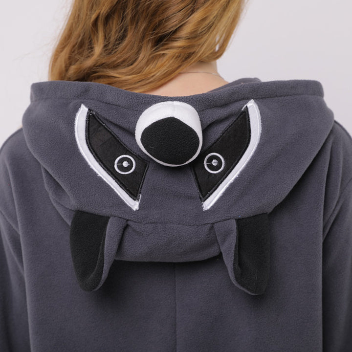 Tvättbjörn-onesie i fleece – mysig djurpyjamas för vuxna