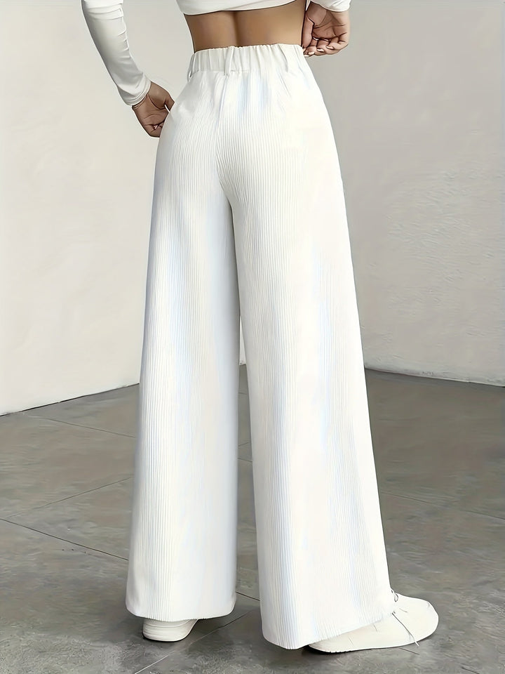Kimberly | Högmidjade Vida Byxor