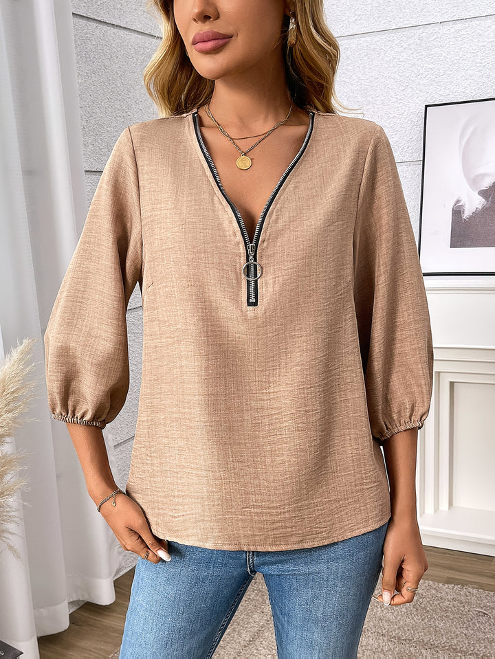 Claudia | Blus med dragkedja fram och V-hals