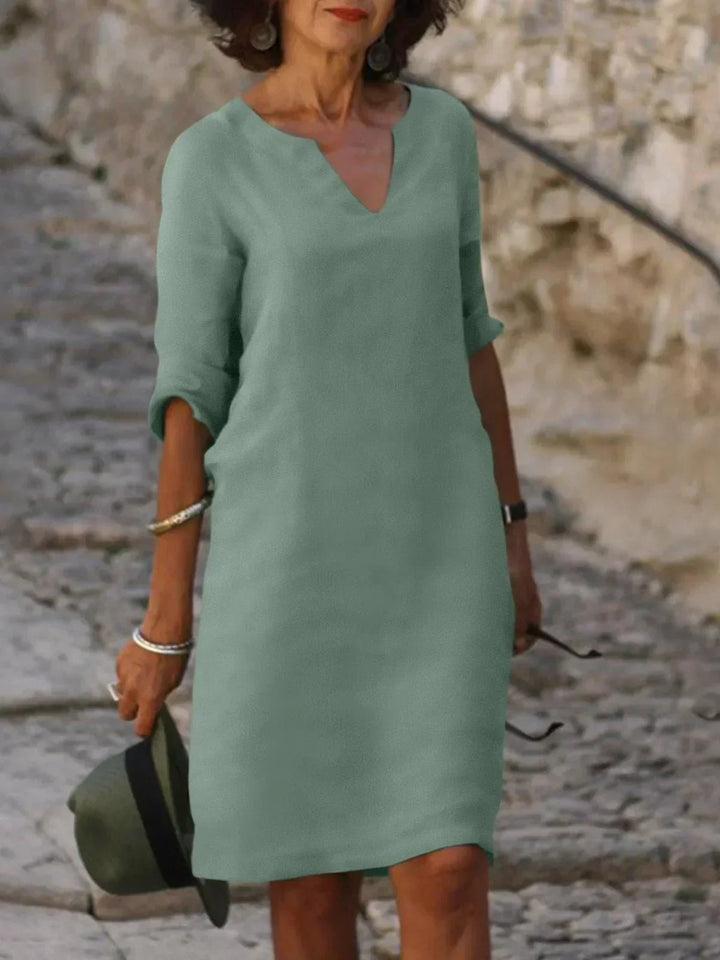 Harper | Elegant V-ringad Draperad Midiklänning